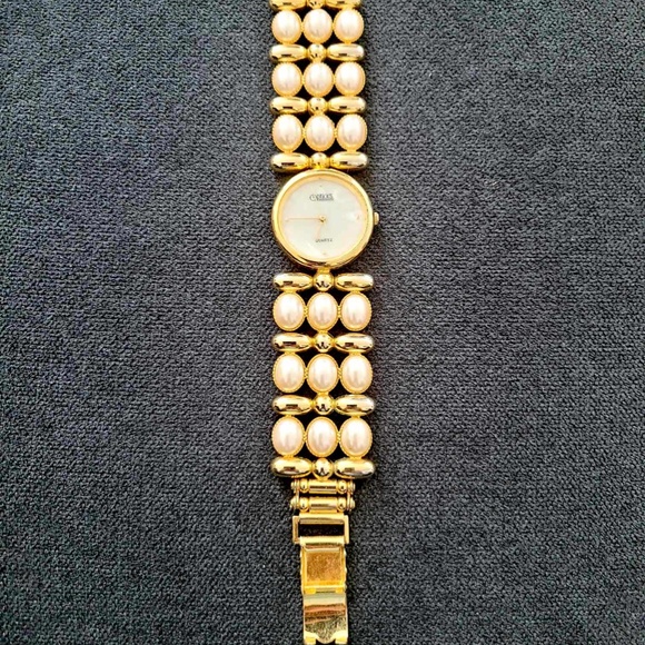 Vintage OPTICKS Celebrity Watch Quartz Oval Pearl Gold Tone Stainless Steel B… - Picture 7 of 11